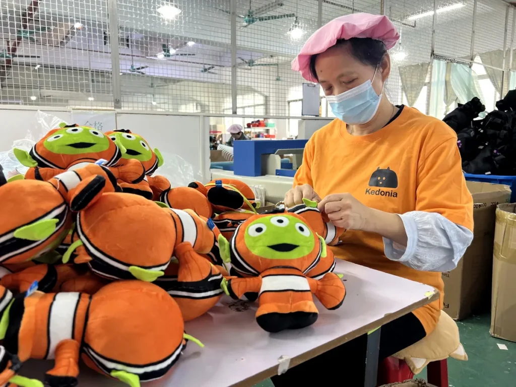 The Plush Maker Dongguan plush workshop with real production team checking custom plush toys